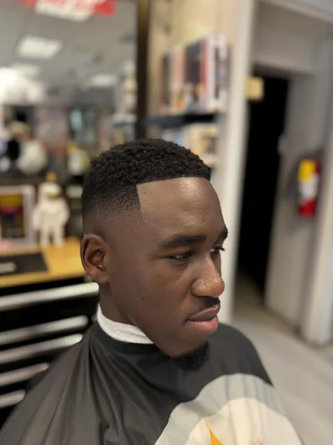 Low taper fade with textured top