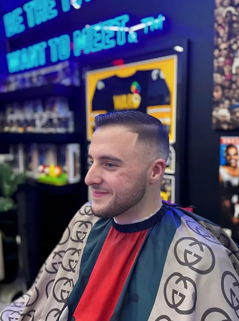 Side-part fade with beard detailing